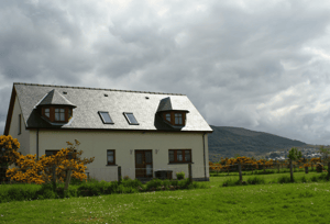  A house in Scotland that has undergone an exterior refurbishment which has a more beneficial sustainable impact on the property.