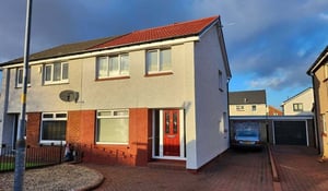 Scottish house with professionally applied exterior wall coating, protecting it from rain, wind, and cold.